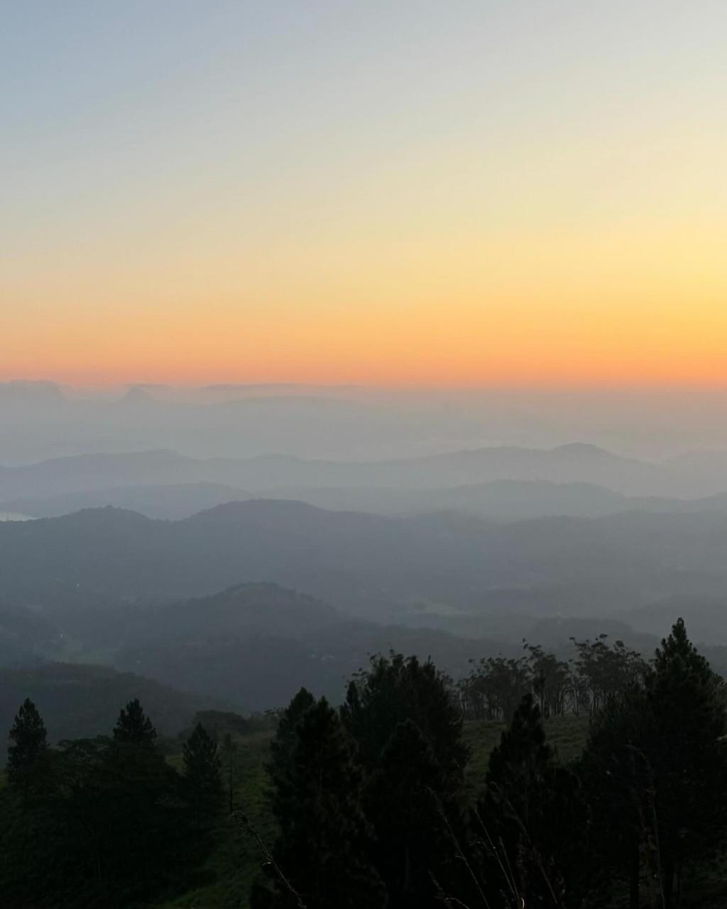 The sunrising over the mountains in Sri Lanka 