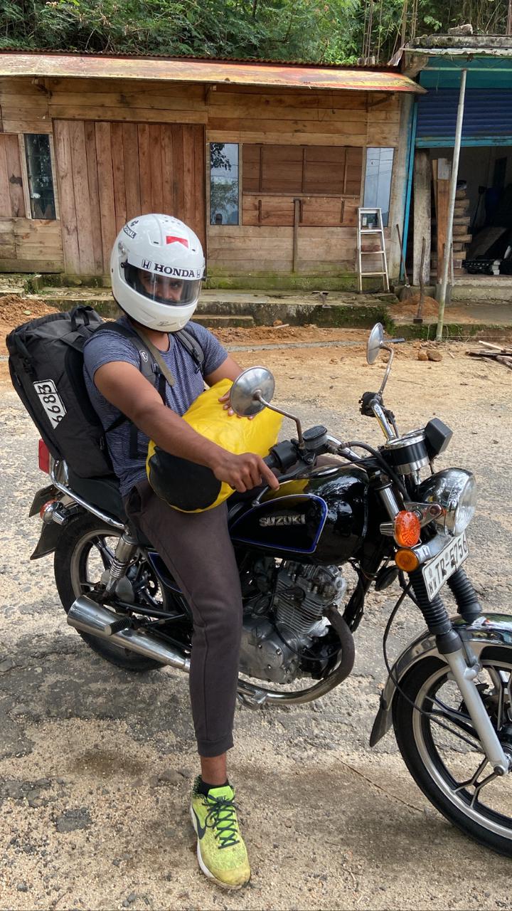 Tourist on a bike roadtrip in Sri Lanka 